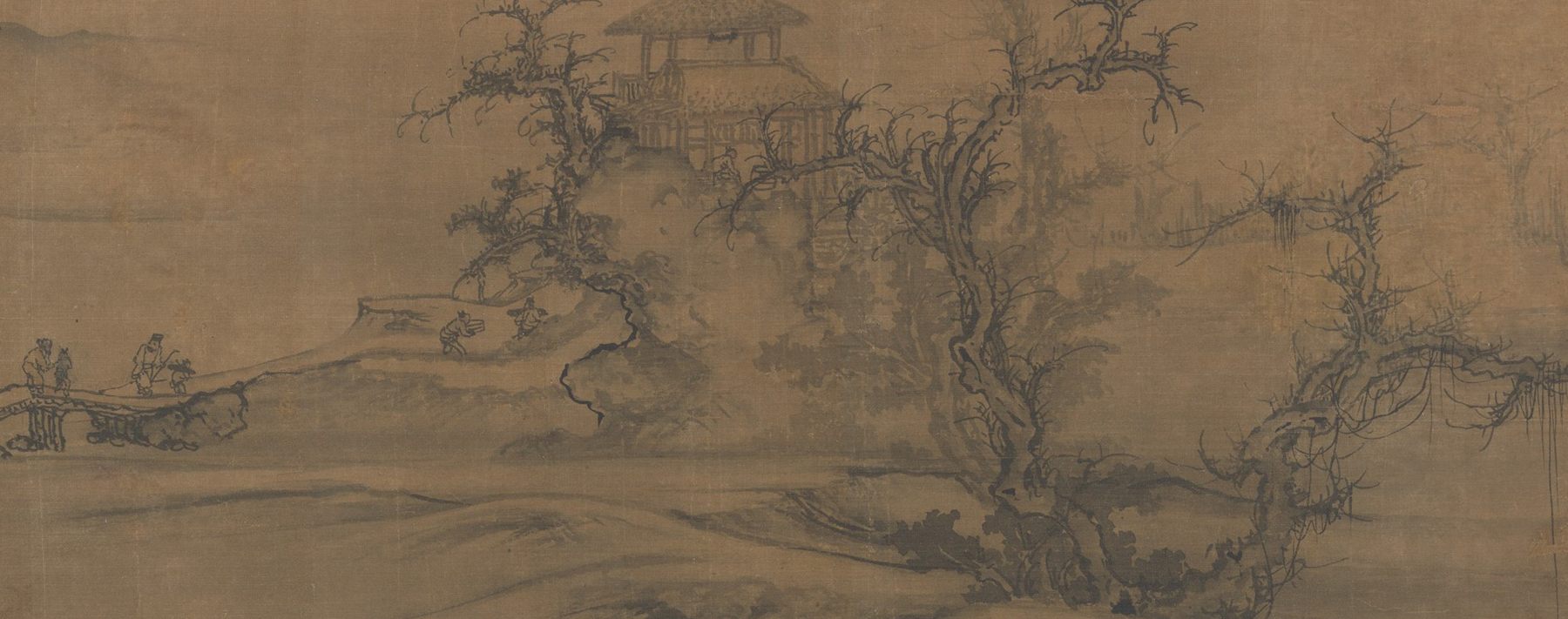 An ink landscape on silk: gnarled leafless trees around a small pavilion on a rise, a flat river reaching to distant hills, and two tiny figures crossing a plank bridge at the left.